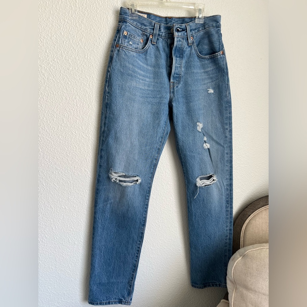 Levi 501 distressed button up jeans. Size 24